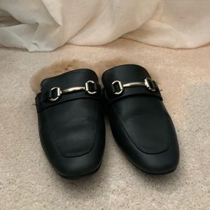 Black mules with fur